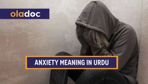 Person with anxiety looking sad with his head bent down.