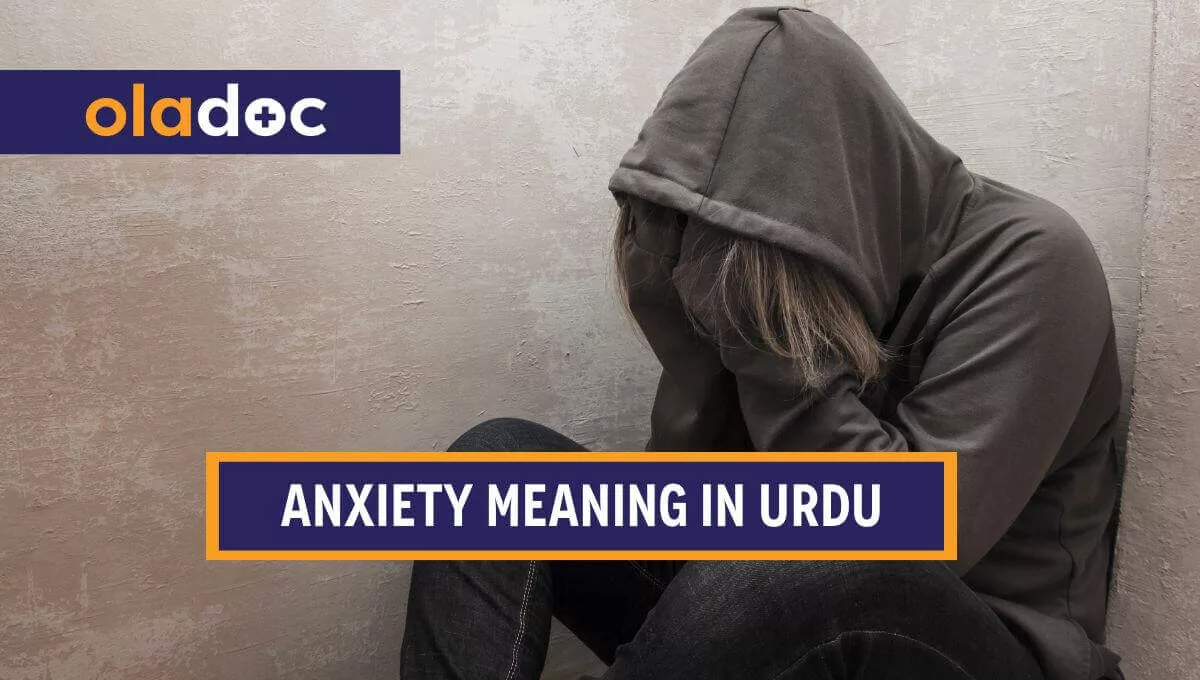 Person with anxiety looking sad with his head bent down.