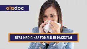 Woman with flu sneezing into a tissue paper.
